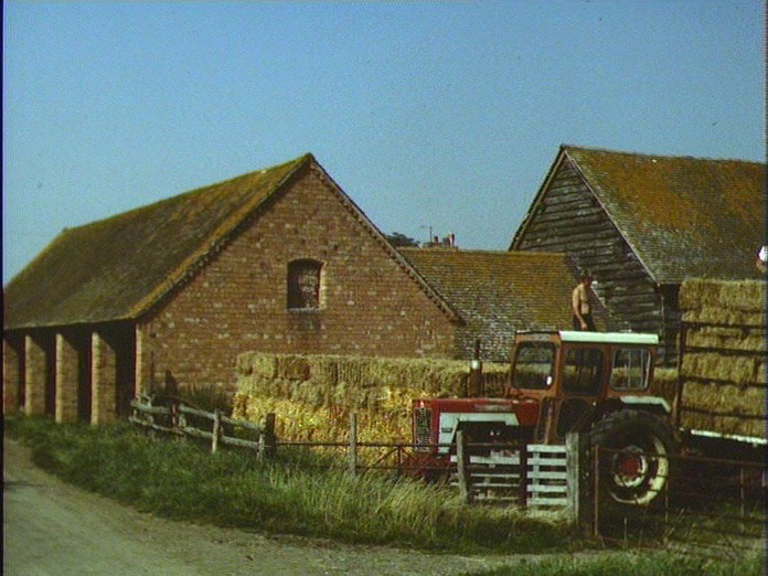 Stacking bales, Churchill Farm-1986